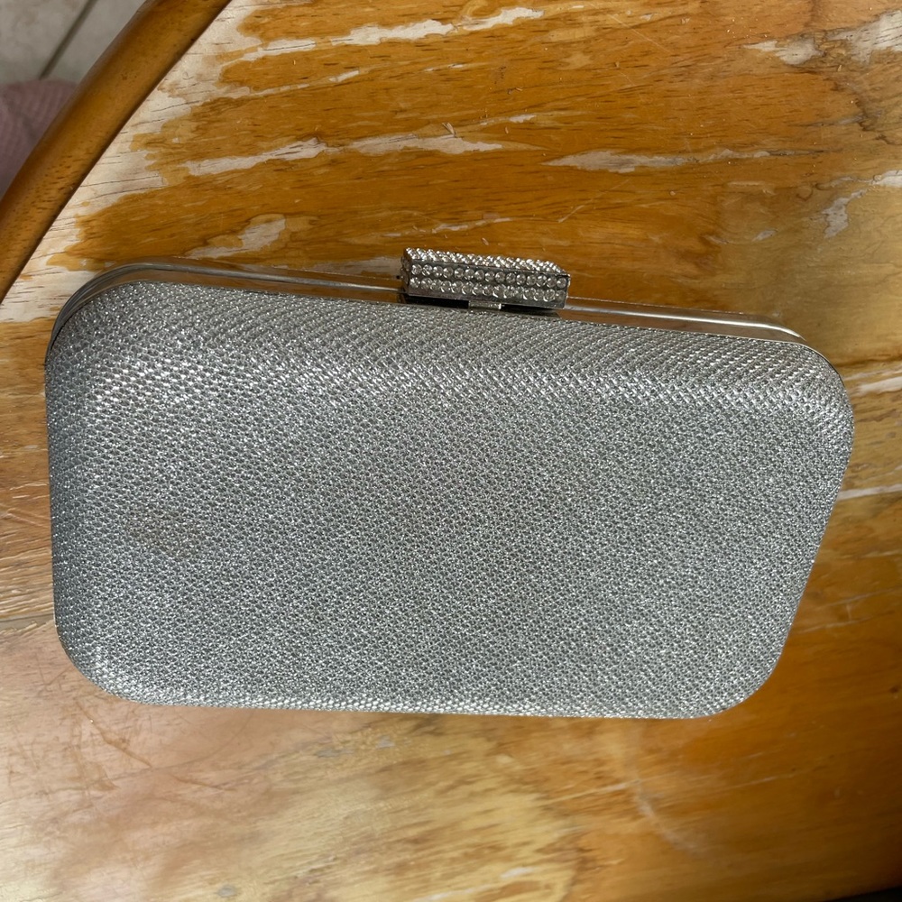 Sparkly clutch with silver shoulder chain and diamanté closure